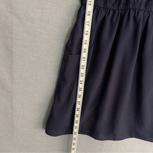 Sleeveless Mini Dress Alythea Purple Ruffled V-Neck Elastic Waist Pockets - Picture 11 of 11